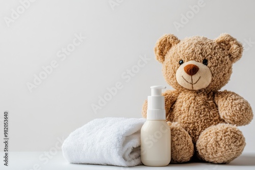 A cheerful teddy bear sitting beside baby shampoo and a soft towel, creating a soothing bath environment for little ones