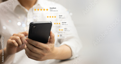 close up young man and hold smartphone and read review online website page about service and experience with many feedback and ranking score from customer for business quality and evaluation concept