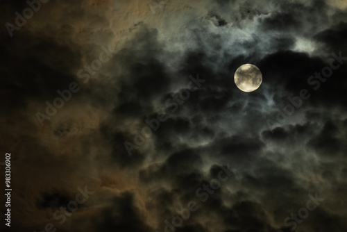 full on dark dramatic night cloudy sky with dense overcast. moody artistic photo for fantasy background or backdrop with copy space