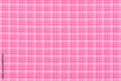 a background texture of pink plaid fabric