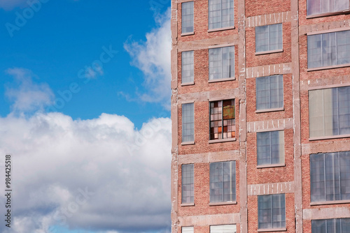 red brick building with blue sky