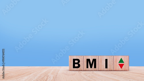 BMI big mac index symbol, Concept words BMI big mac index on wooden cube, Medicine and Body Mass Index concept, Doctor health.