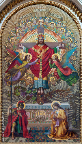 ASTI, ITALY - SEPTEMBER 10, 2024: The fresco of Crucificted Jesus the King in the church Santuario di Nostra Signora Porta Paradisi by Anacleto Laretto (1927).