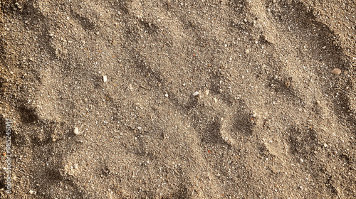 sandy soil texture a seamless texture of sandy soil with fine, light brown grains scattered evenly, the surface appears dry and porous, evoking a warm and arid atmosphere