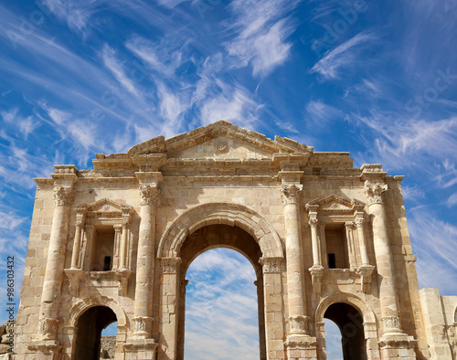 Arch of Hadrian in Gerasa (Jerash)-- was built to honor the visit of emperor Hadrian to Jerash in 129/130 AD, Jordan. Against the background of a beautiful sky with clouds