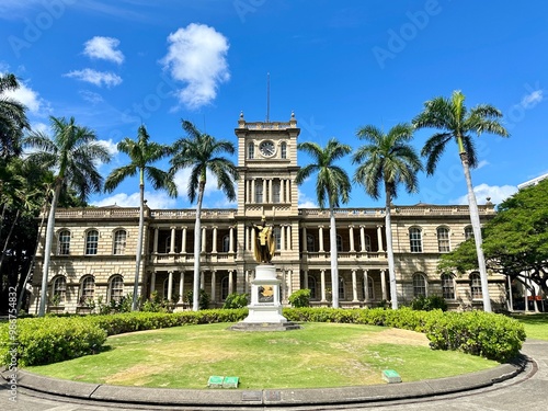 Majestic King Kamahameha I statue standing in front of Ali'iolane Hale in downtown Honolulu, Hawaii