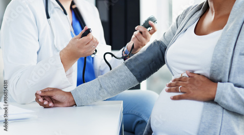 Hospital, pregnant woman and doctor with appointment for blood pressure, monitor heart rate and checkup. Healthcare, patient and obstetrician with consultation for pregnancy, hypertension or wellness