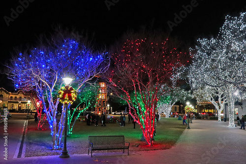 Market Platz Christmas, Fredericksburg, Texas 12-17-23: The photograph captures the festive scene at the Market Platz along Main Street in Fredericksburg, Texas, during the Christmas season.