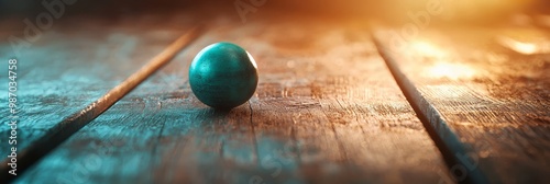  A single egg on a wooden table, adjacent to a pair of chopsticks