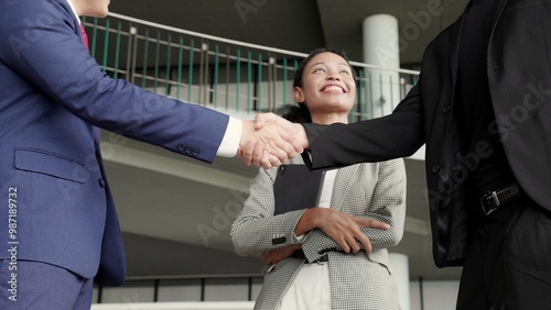 Group young business man and woman meeting and discussing and handshake for congratulating office, businessman planning with partner or consulting, teamwork and colleagues, business and team concept.