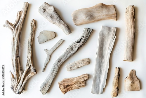 Assorted driftwood pieces on white background