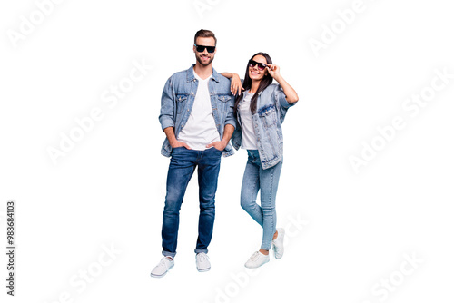 Full body photo of pretty man and woman with eyewear eyeglasses smiling wearing denim jeans jacket isolated over blue background