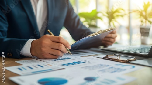 Legal officer reviewing mortgage agreement in modern office, credit report in the background, mortgage and credit review, financial document analysis