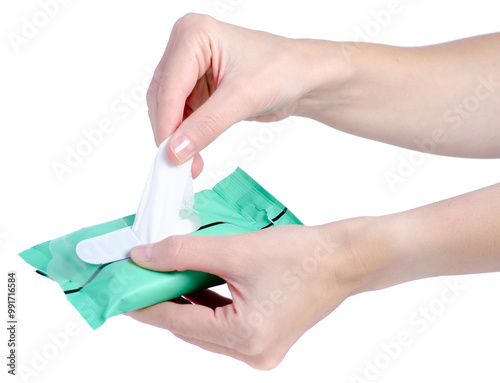 a pack of wet wipes in female hand on white background isolation