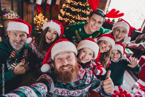 Portrait of friendly peaceful family make selfie presents thumb up gather celebrate new year xmas flat indoors