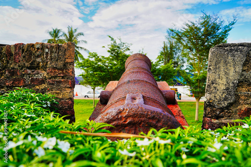 Close up of a cast iron cannon and gun emplacement on the walls of historic Fort Cornwallis,built in 1786 by the British east india company overlooking Georgetown harbour in Georgetown,Penang,Malaysia