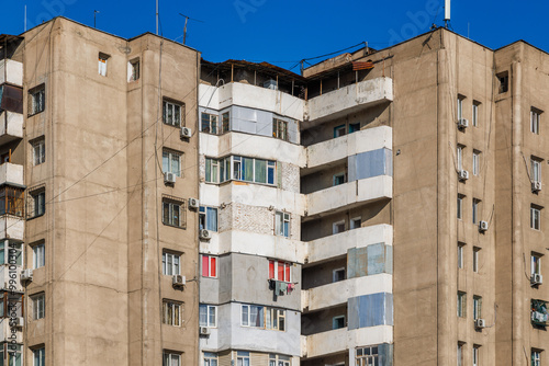 poor multistory apartment building at sunny day in Bishkek, Kyrgyzstan