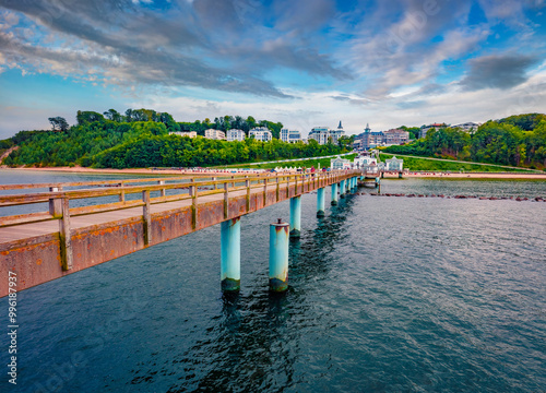 Splendid summer view of popular historical landmark - Sellin pier. Nice morning cityscape of Sellin resort town on the German island of Rugen, Germany, Europe. Beautiful seascape of Baltic Sea.