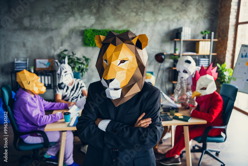 Photo of panda rooster gorilla sloth zebra raccoon mask business people lion boss crossed arms loft interior office indoors