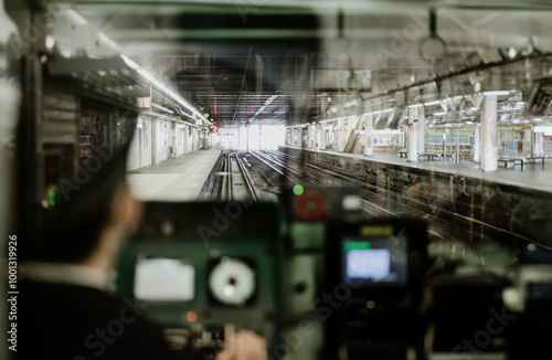 Train driver waiting in cockpit Kyoto, Japan, Metro train driver,