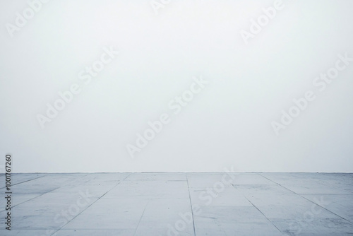 A minimalistic empty space featuring a light-colored floor and wall creating a clean and open atmosphere ideal for various uses