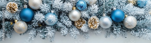 Frosted-themed Christmas tree featuring silver and blue decorations, with a hint of glimmer from the ornaments, showcased on an immaculate white background , Bird's-eye view