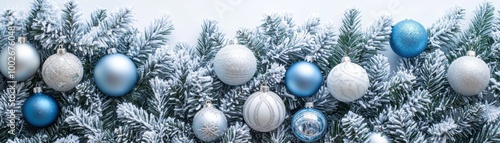 Frosted-themed Christmas tree featuring silver and blue decorations, with a hint of glimmer from the ornaments, showcased on an immaculate white background , Bird's-eye view