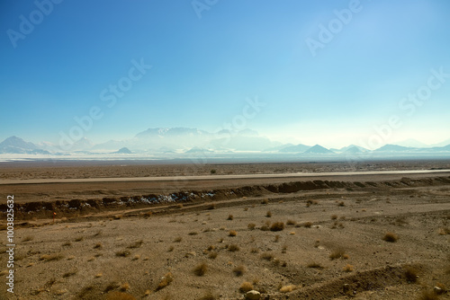 A gravelly desert (reg) in the foothills. Building a road through wild uninhabited area. Iran