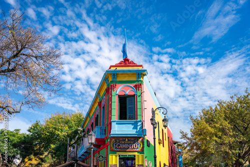 Vibrantly painted houses in Caminito, La Boca neighborhood of Buenos Aires, showcasing the area's rich cultural and artistic heritage.