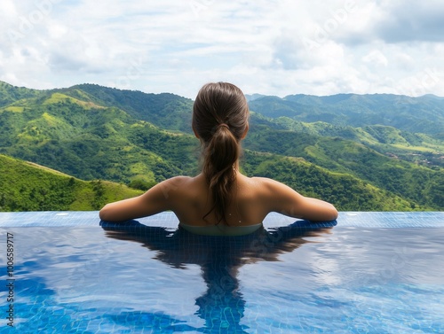 A serene view from an infinity pool overlooking lush green mountains, ideal for relaxation and escape into nature.