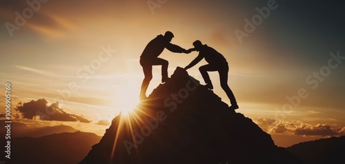 Silhouette of two professionals on a mountain, one pulling the other up, representing leadership and mutual success