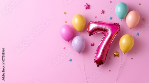 An elegant balloon in the shape of the number seven displays prominently against a pink background, perfect for a birthday party