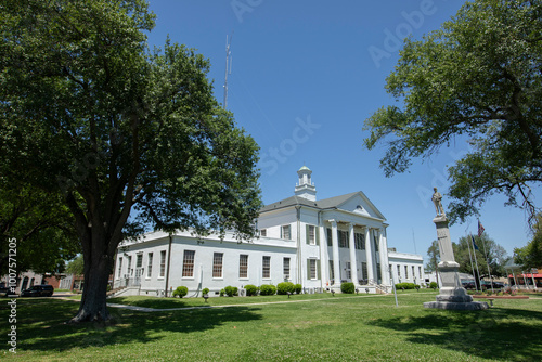 Tallulah, Louisiana, USA - April 23, 2024: Afternoon sun shines on the historic 1887 Madison Parish Courthouse of downtown Tallulah.