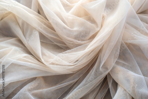 White sheer fabric close-up with delicate texture and translucence