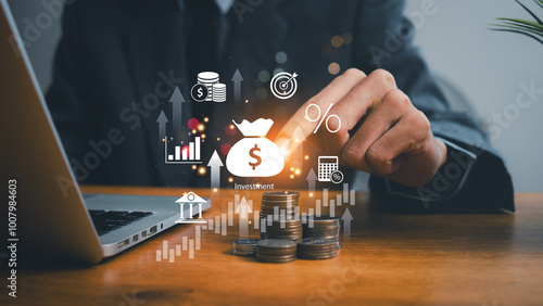 finance and investment concept, invest money, fundraising, ROI return on investment, Interest rate and dividend concept, Businessman is calculating income and return on investment in percentage.