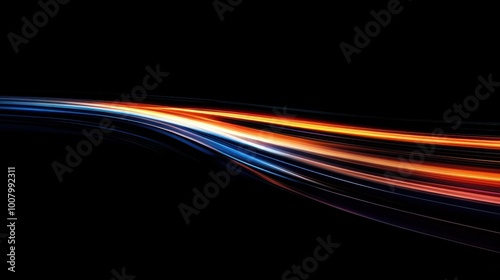 Dynamic light trails streaking across a dark background creating a sense of speed and motion highlighting the rush of energy and excitement of high-speed travel