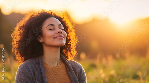 Mixed race woman relax and breathing fresh air outdoor at sunset