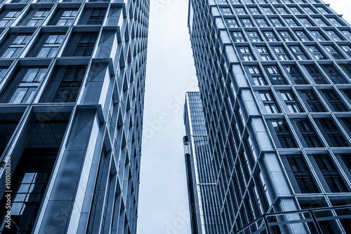 Modern Architectural Design with Tall Skyscrapers against a Cloudy Sky