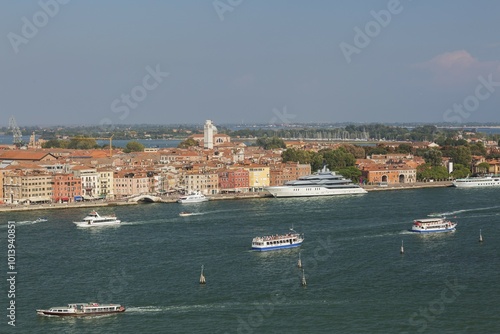 City view with excursion boats and vaporetto in the lagune, Castello district, Venice, Veneto, Italy, Europe