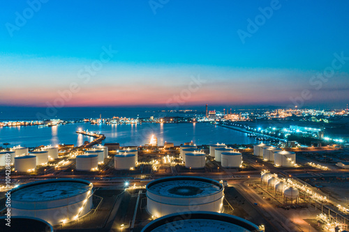 Aerial morning sun at world-class oil refinery, Petroleum refinery in the industrial factory of heavy industry zone, oil production plant, industrial process plant, oil storage tank and pipeline steel