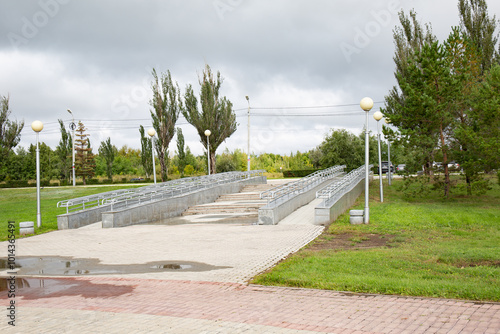 The central entrance to the Victory Park in Omsk in summer