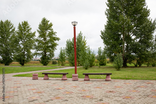 sidewalk in the Bird Harbor Nature Park Omsk in summer