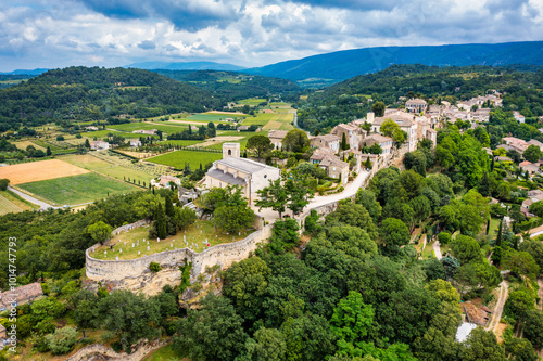 Menerbes village in Provence on a summer day, France, Luberon, Vaucluse. Village of Menerbes, the village and the Luberon mountains also called the most beautiful village of Luberon, France, Provence.