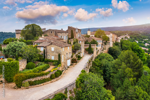 Menerbes village in Provence on a summer day, France, Luberon, Vaucluse. Village of Menerbes, the village and the Luberon mountains also called the most beautiful village of Luberon, France, Provence.