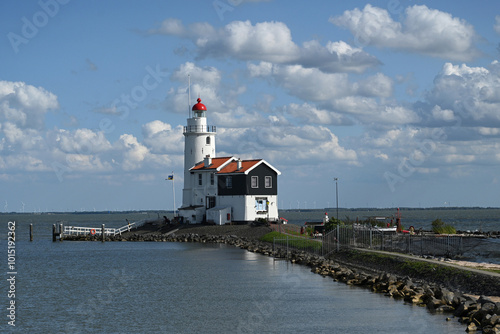 The Horse of Marken lighthouse (Paard van Marken) on the Dutch peninsula Marken, on the IJsselmeer. Lighthouse Paard van Marken was built in 1839.