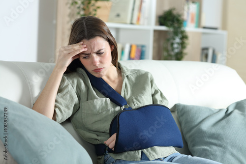 Worried convalescent woman suffering alone at home