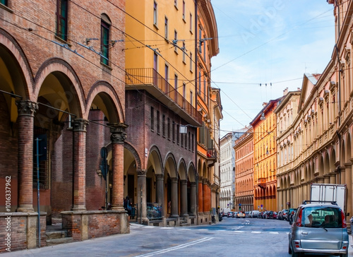 Scenic winding Via Farini street with stunning historic houses, Bologna, Italy