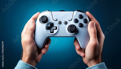 Male hands holding a gaming controller