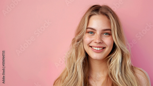 Smiling young woman with blonde long groomed hair isolated on pastel flat background with copy space