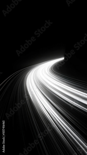 Long exposure light trails in the dark: bright streaks crisscrossing the night sky against a backdrop of silhouetted trees and cityscape